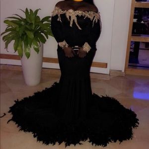 Elegant black dress with gold details!